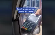 VIDEO ¡Limpiavidrios cobra con terminal bancaria!