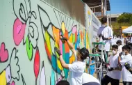 Polica municipal contribuye a eliminar grafiti en escuela secundaria