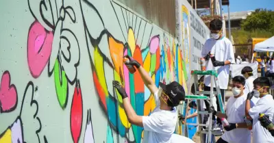 Contribuyen a eliminar grafiti en escuela secundaria