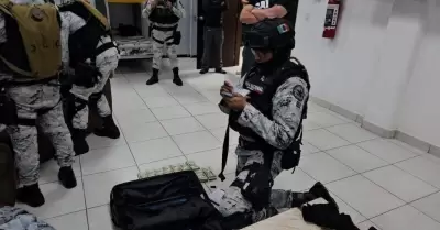 Hallan armas sin registro y dinero en efectivo en cuartel de la GN en Tepatitln