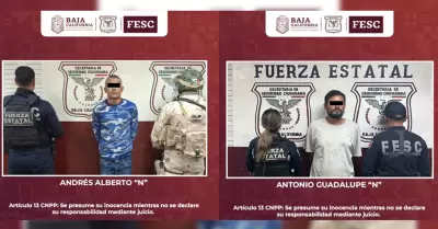 Capturan a dos hombres con �rdenes de aprehensi�n