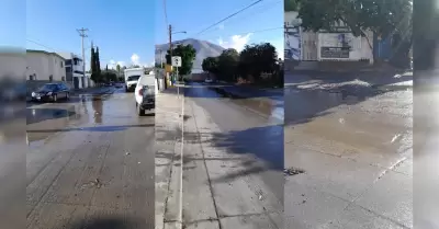 Vecinos denuncian aguas negras y bache en la calle Esperanza del fraccionamiento