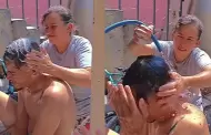 "Siempre va a ser mi chiquito" Mujer ba�a a su hijo adulto en el lavadero