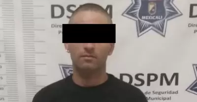 Detenido por portaci�n de arma prohibida y orden de aprehensi�n por narcomenudeo