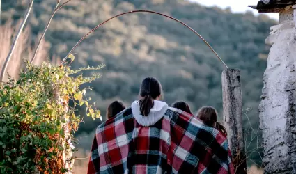 Con tenacidad y esperanza, mujeres y ni�os en movilidad desaf�an al r�gimen migr