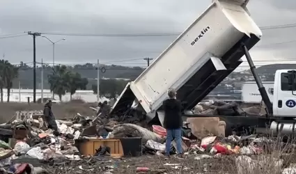 Reincidentes, due�os de 10 predios en Presa Este donde cobran por quemar basura;