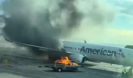 Avi�n de American Airlines se incendia
