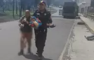 �Escena dram�tica! Mujer resguarda de las llamas a su nieta