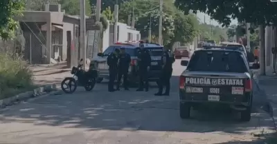 Polic�a persigue a hombres armados