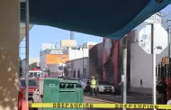 Cuerpos de emergencia realizan b�squeda de personas lesionadas tras incendio en comercio del Centro
