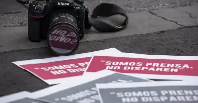 Periodistas.