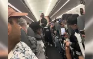 Juli�n Qui�ones recibe emotiva bienvenida en un avi�n; pasajeros lo ovacionan