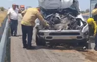 Rescatan a mujer y menor atrapados tras choque contra tr�iler en la M�xico 15